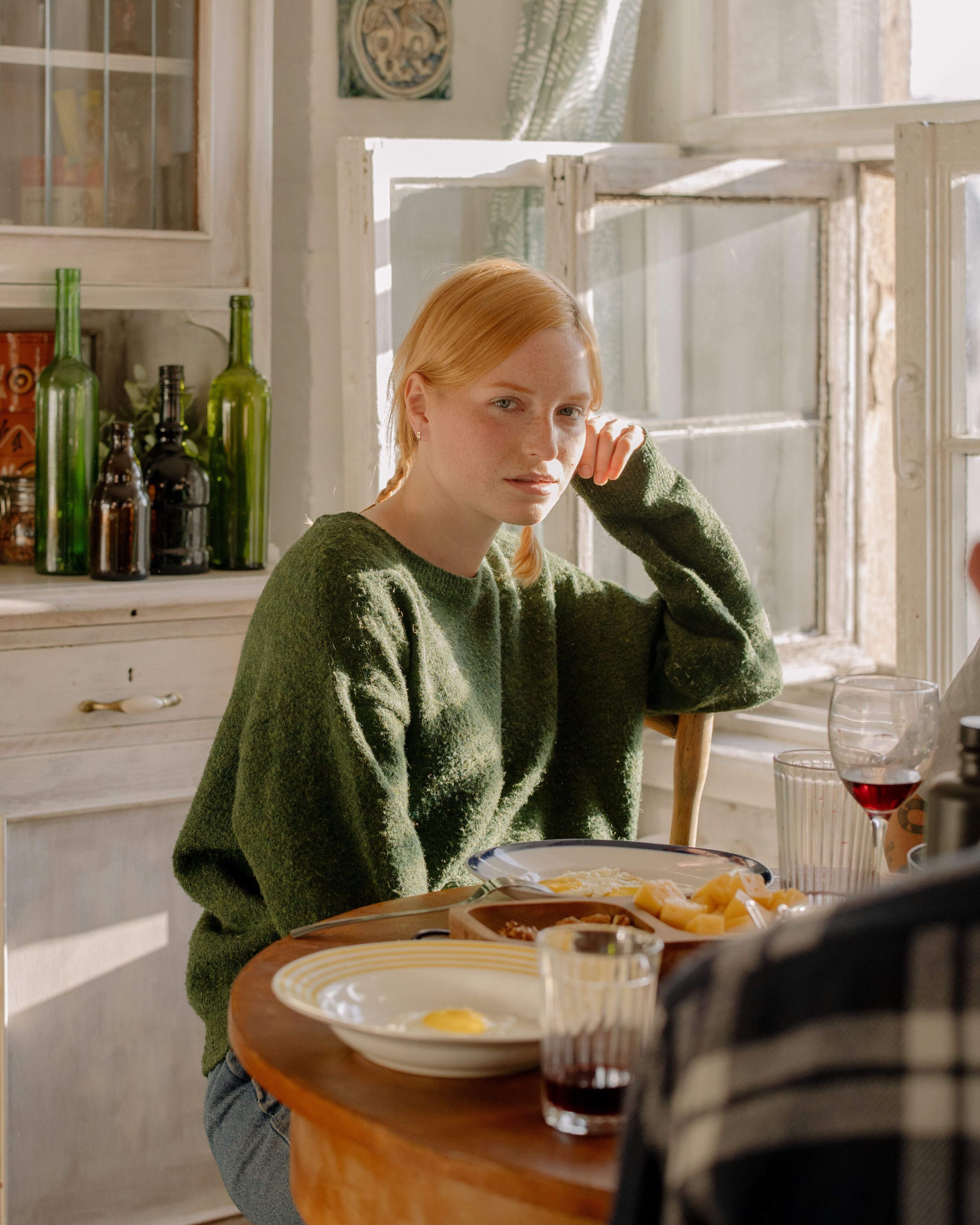 People sitting at breakfast table