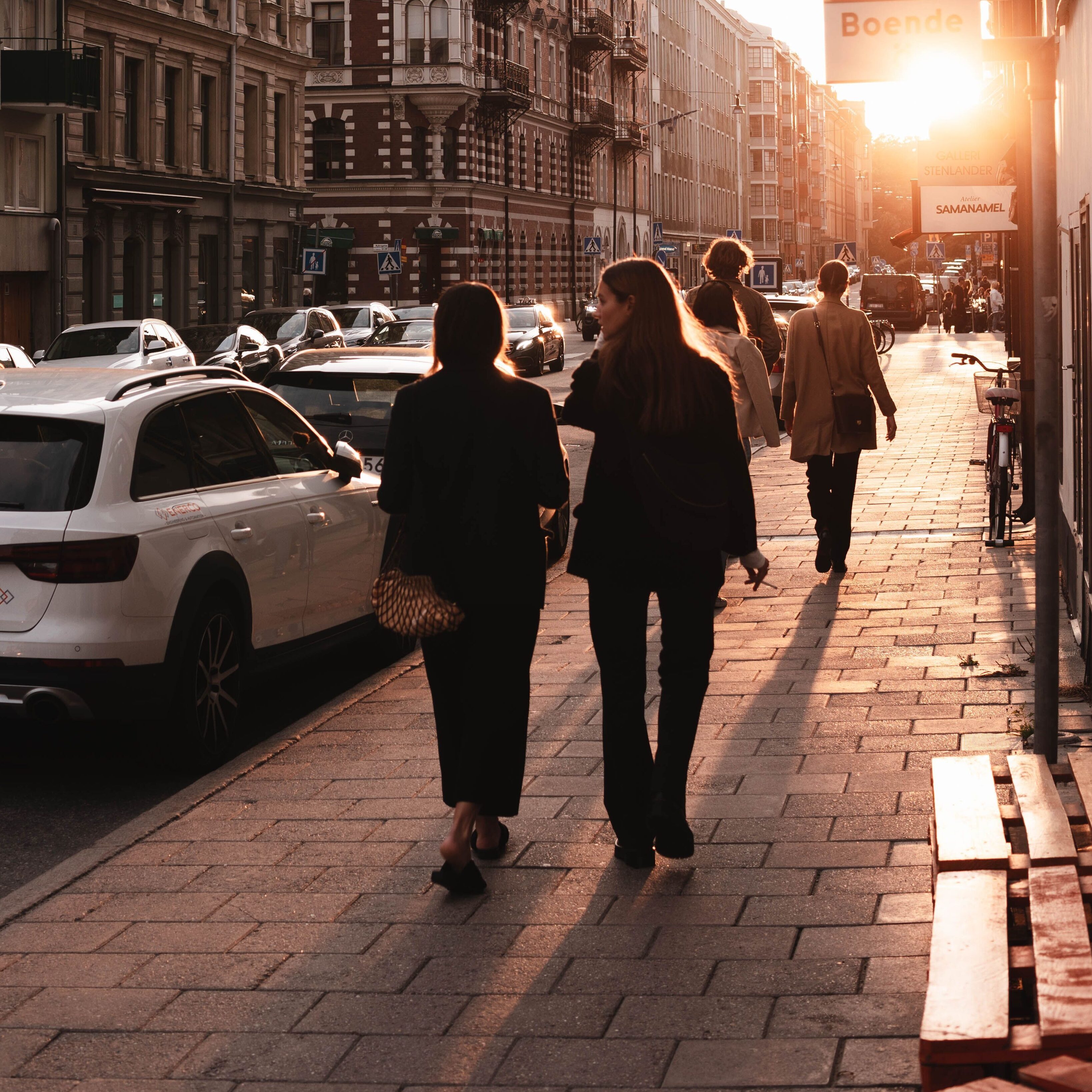 People walking in the street sunlight