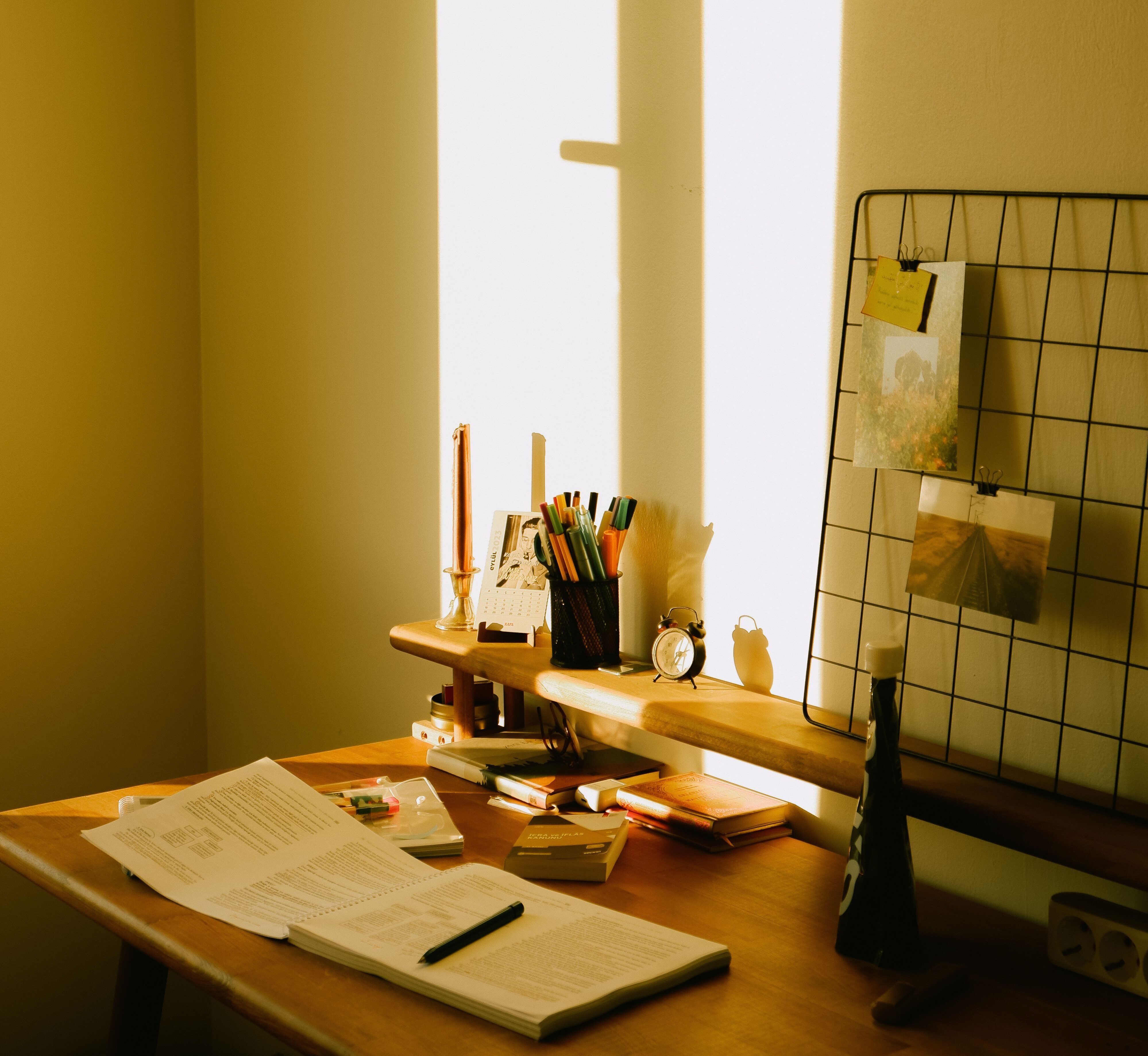 Traces of work on a desk in sunlight