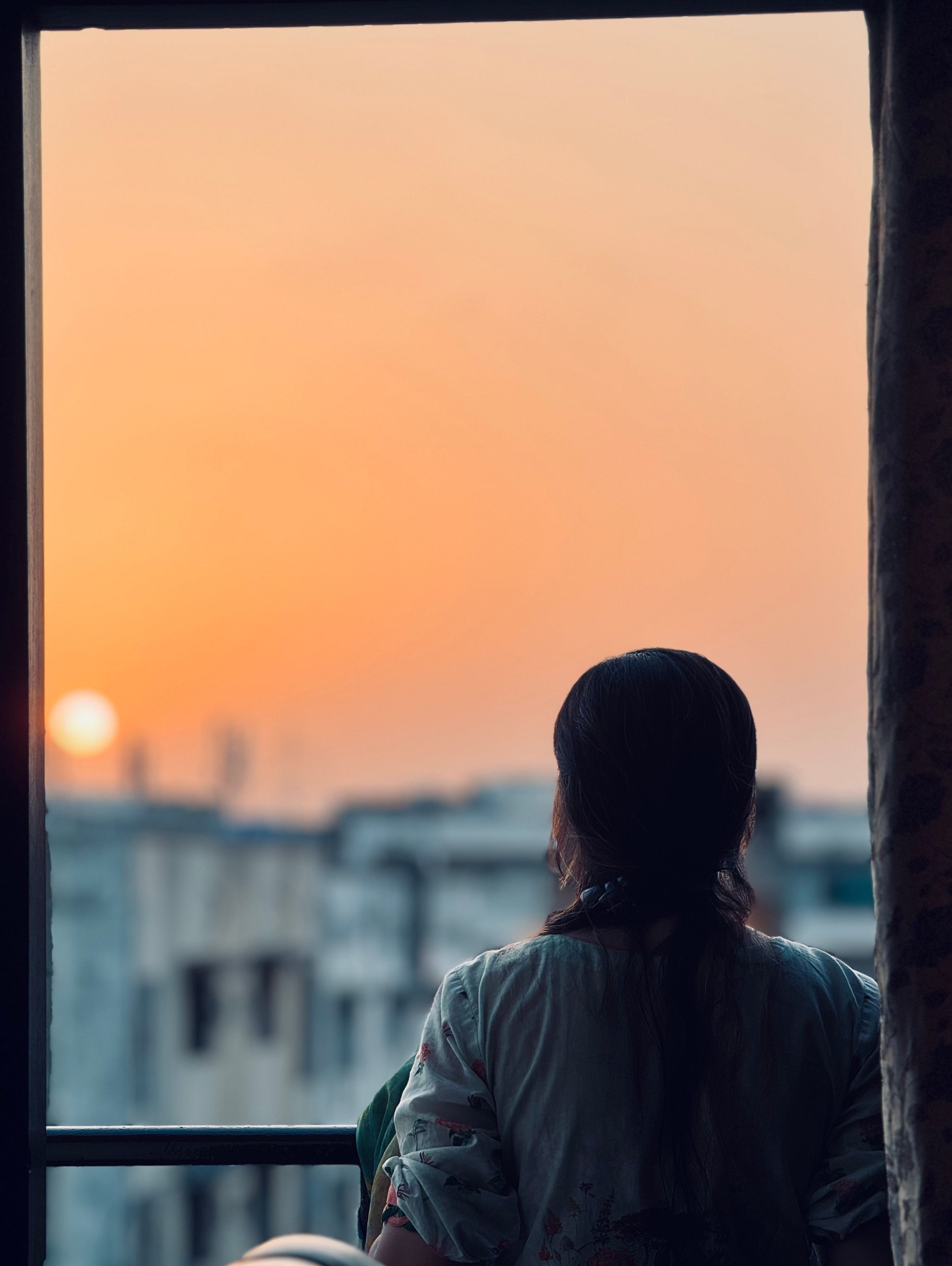 Woman looking at sunset 2 pexels 28498059